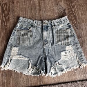 Ripped Denim Shorts with Tassels